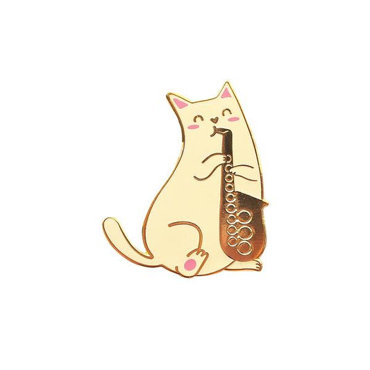 By Shoal. Saxophone Cat Pin. Hard enamel with shiny gold metal finish. Comes with double pin posts and two rubber clutch backs. Measures 1.38 inch tall. Also available in store at FOLD Gallery DTLA.