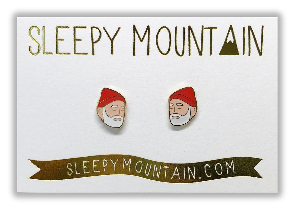 By Sleepy Mountain. Enamel color Steve Zissou Earrings are 22k gold plated stainless steel. Includes butterfly backings as well as nylon stops. Please note that due to everyone’s monitor displaying differently, the colors you see may vary. Measures 0.5 inches.