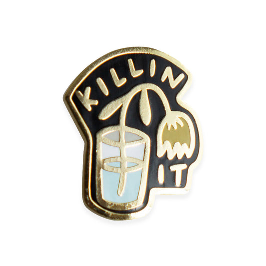 By Stay Home Club. Killin' It Pin details: Gold metal and hard enamel. Comes with a metal locking pinback so it'll stay on your stuff real good! Measures 1"x.75". Please note that due to everyone’s monitor displaying differently, the colors you see may vary.