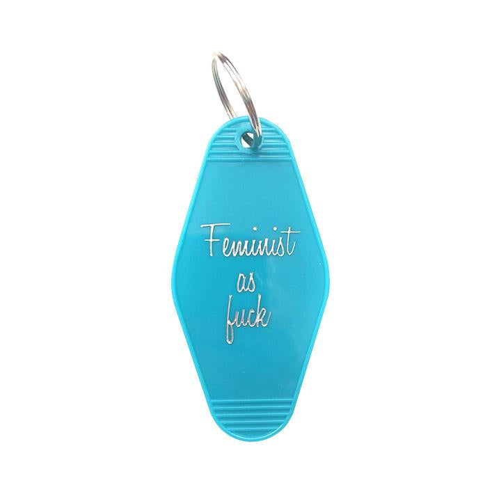By Sweet Perversion. Motel-style Feminist as F*ck Keychain with 1inch split key ring included. Please note that due to everyone’s monitor displaying differently, the colors you see may vary. Measures 3.5 inch long.