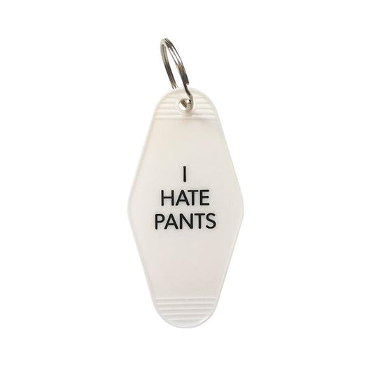 By Sweet Perversion. Motel-style I Hate Pants Keychain with 1 inch split key ring included. Measures 3.5 inches long. Also available in store at FOLD Gallery DTLA.