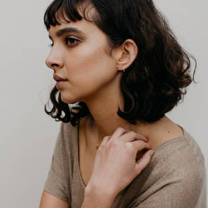 By TUMBLE. Arch Stud Gold Filled Earrings. 14k gold filled earrings. All earring posts are sterling silver and comes with clear earring backs. Please note that due to everyone’s monitor displaying differently, the colors you see may vary. Measures 2cm. FOLD Gallery Dtla.