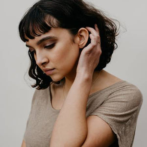 By TUMBLE. Bar Stud Earrings in 14k gold filled. All earring posts are sterling silver and comes with clear earring backs. Please note that due to everyone’s monitor displaying differently, the colors you see may vary. Measures 1cm. FOLD Gallery Dtla.