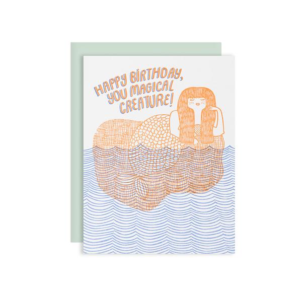 by The Good Twin. This Mermaid Birthday Card is a two color letterpress print on 100% PC fiber paper. Packed in a cello sleeve with corresponding envelope. Envelope color may vary. Blank inside. Measures 4.25 x 5.5 inches folded.