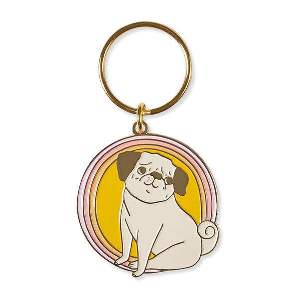 by The Good Twin. Peggy Keychain. This iron enamel keychain with gold plating is packed in a clear rigid box. Measures 2 inches. Also available in store at FOLD Gallery DTLA.