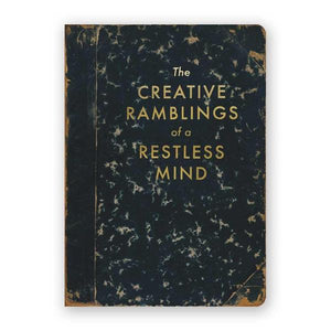 By The Mincing Mockingbird & The Frantic Meerkat. The Creative Ramblings of a Restless Mind Journal. 120 blank pages of 120 gsm creamy off-white paper that takes ink beautifully. Binding lies flat when open. Measures 5 inch wide x 7 inch tall. Also available in store at FOLD Gallery DTLA.