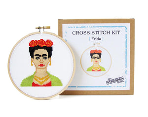 By The Stranded Stitch. Stitch some art appreciation with the Frida DIY Cross Stitch Kit. Kit Includes: Basic cross stitching instructions. Counted cross stitch pattern. DMC embroidery floss and color chart. 14 count white aida cloth. 5 inch Embroidery hoop. Needle. FOLD Gallery Dtla.