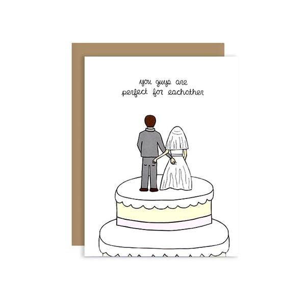 By Unblushing by Julie Ann Art. You two freaks are perfect for each other! Butt Touching Cake Toppers Card features 100% recycled kraft envelope. Professionally printed on 110# recycled card stock. Packaged in a compostable clear sleeve. Blank inside. Also available in store at FOLD Gallery in DTLA.