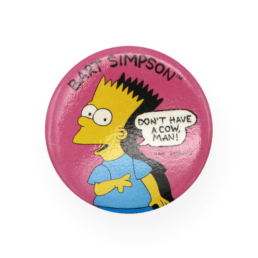 Vintage 1989 The Simpsons Pinback Button.  Add a little flair to your jacket, backpack or tote with this Vintage Don't Have a Cow Man Pinback Button!  Measures 2 inches.  Please note that due to everyone’s monitor displaying differently, the colors you see may vary.