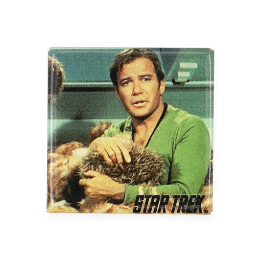 Vintage James T. Kirk Pinback Button  Add a little flair to your jacket, backpack or tote with this Vintage James T. Kirk Pinback Button! This button depicts Captain Kirk holding a tribble from the episode "Trouble with tribbles".  Measures 1.5 x 1.5 inches.