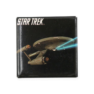 Vintage S.S Enterprise Pinback Button  Add a little flair to your jacket, backpack or tote with this Vintage S.S Enterprise Pinback Button! This button depicts the S.S. Enterprise firing phasers.  Measures 1.5 x 1.5 inches.